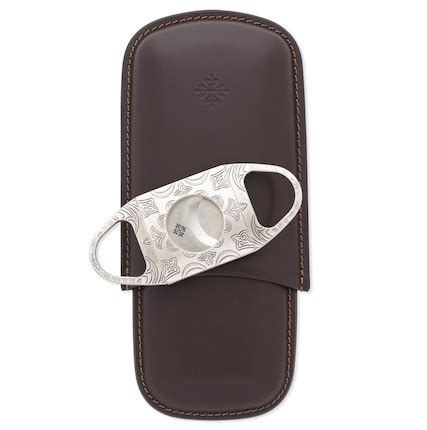 patek philippe cigar cutter|Patek Philippe. A finely engraved stainless steel cigar cutter and .